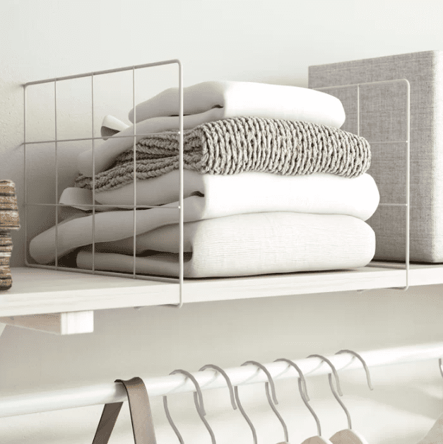 Adding shelves and dividers inside a wardrobe frame for organized storage — step in how to build a wardrobe frame with custom shelving and sections.