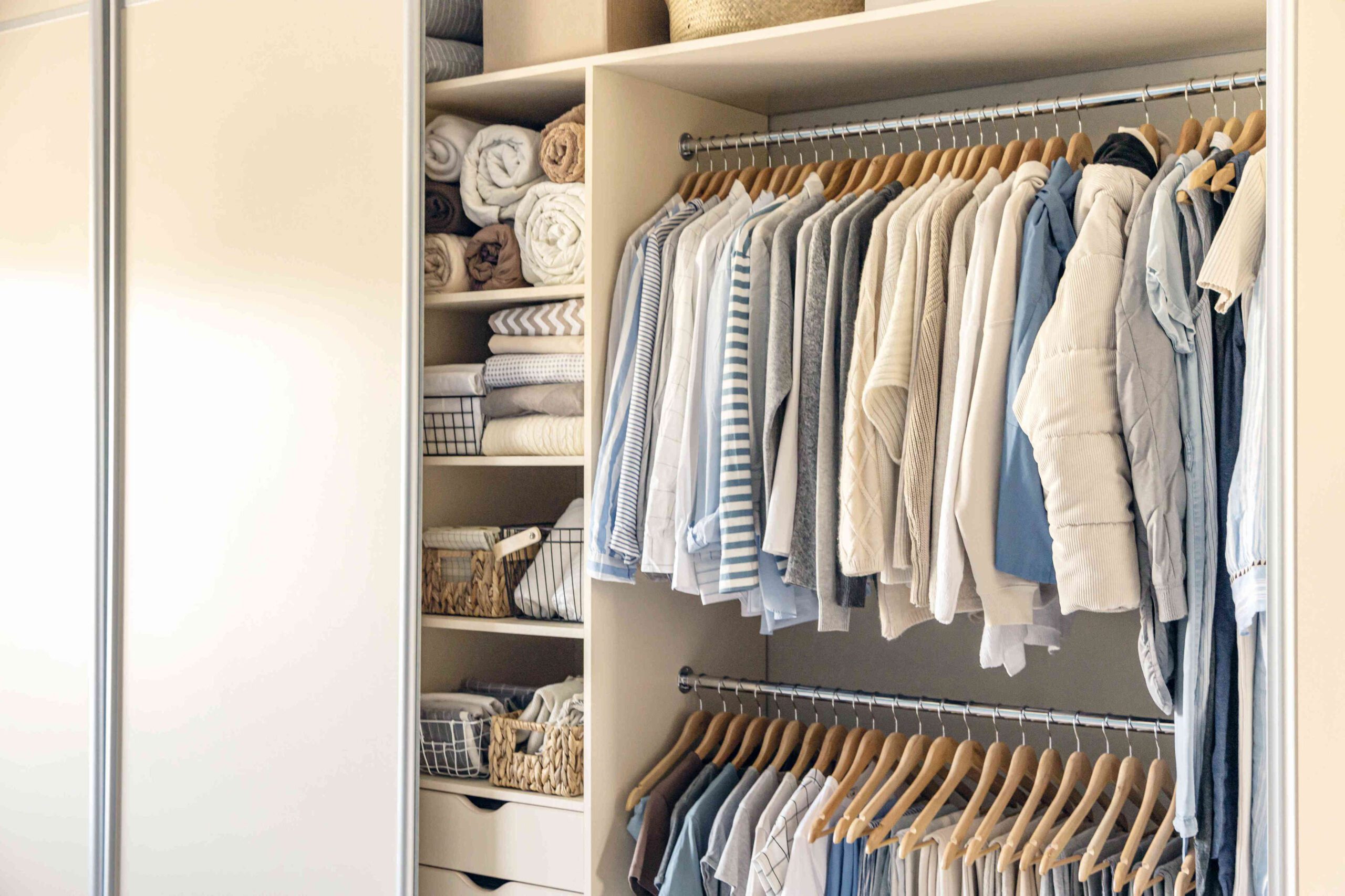 wardrobe or closet example showing a clean and organized built-in closet
