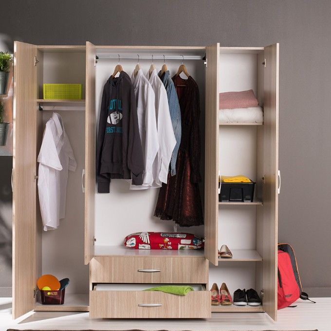 wardrobe vs cupboard example showing freestanding wardrobe with hanging clothes and storage drawers.
